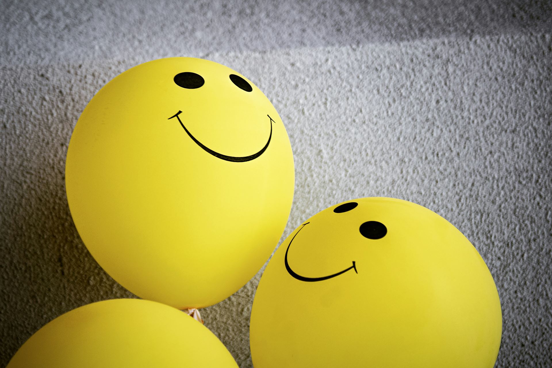 Yellow smiley faces balloons
